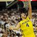 Michigan freshman Mitch McGary reaches for a basket during the first half at Breslin Center in East Lansing on Tuesday, Feb. 12. Melanie Maxwell I AnnArbor.com